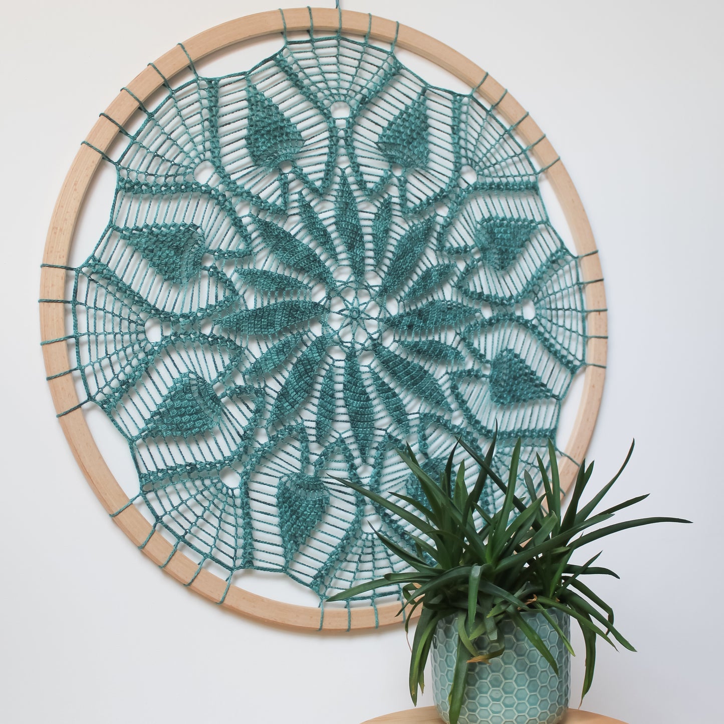 Large turquoise crochet doily mandala