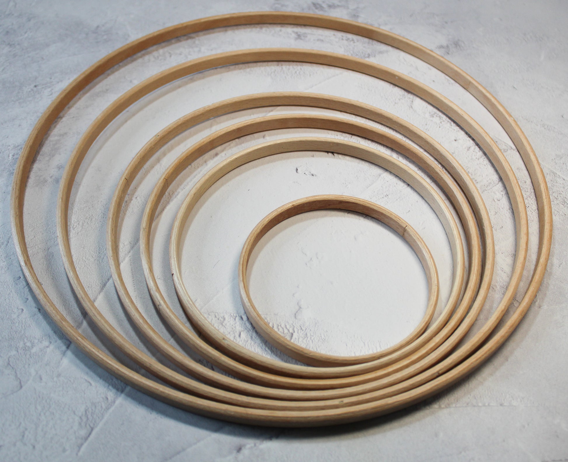 A selection of beech wooden rings from 10cm to 30cm in diameter for crochet, macrama or other craft.